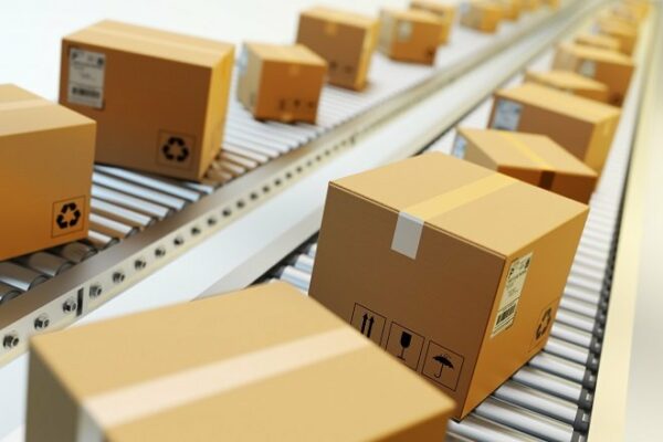 packages-delivery-packaging-service-and-parcels-transportation-system-concept-cardboard-boxes-on-conveyor-belt-in-warehouse